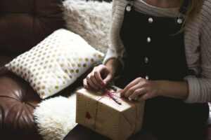 person opening gift