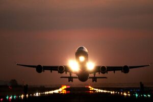 plane taking off at night