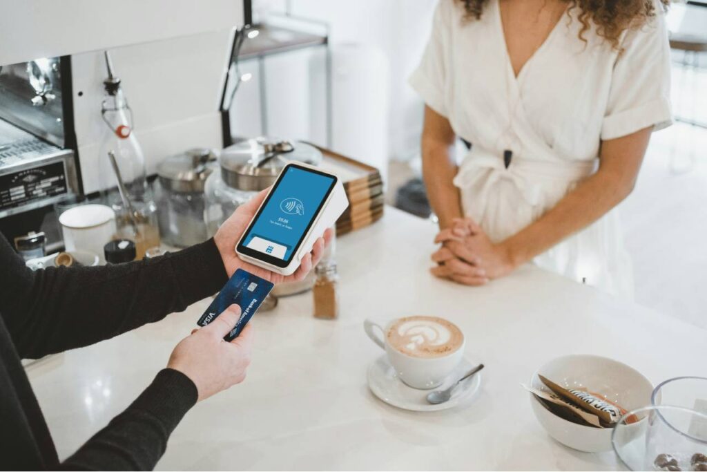 person paying with a credit card